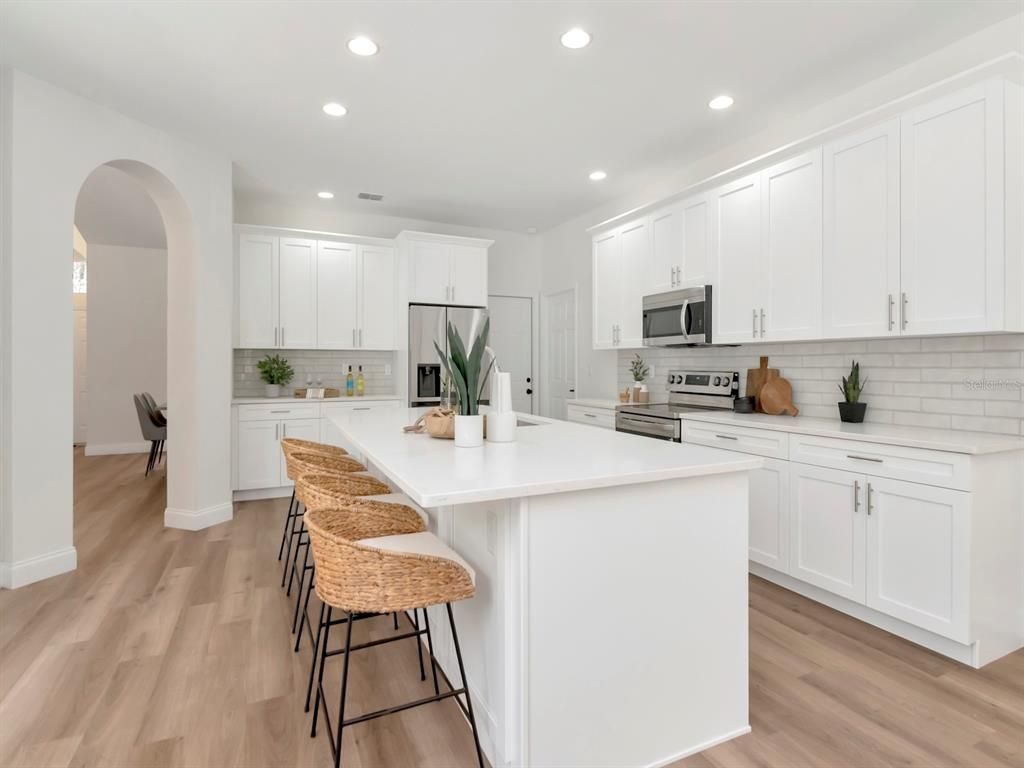 Interior, Kitchen, Recessed Lighting, Stainless Steel Appliances, Wood Texture Flooring