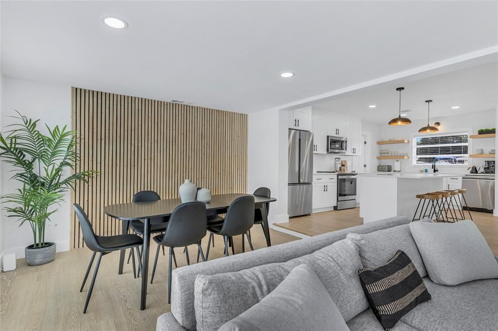 Dining room, Interior, Kitchen, Pendant Lights, Recessed Lighting, Stainless Steel Appliances, Wood Texture Flooring