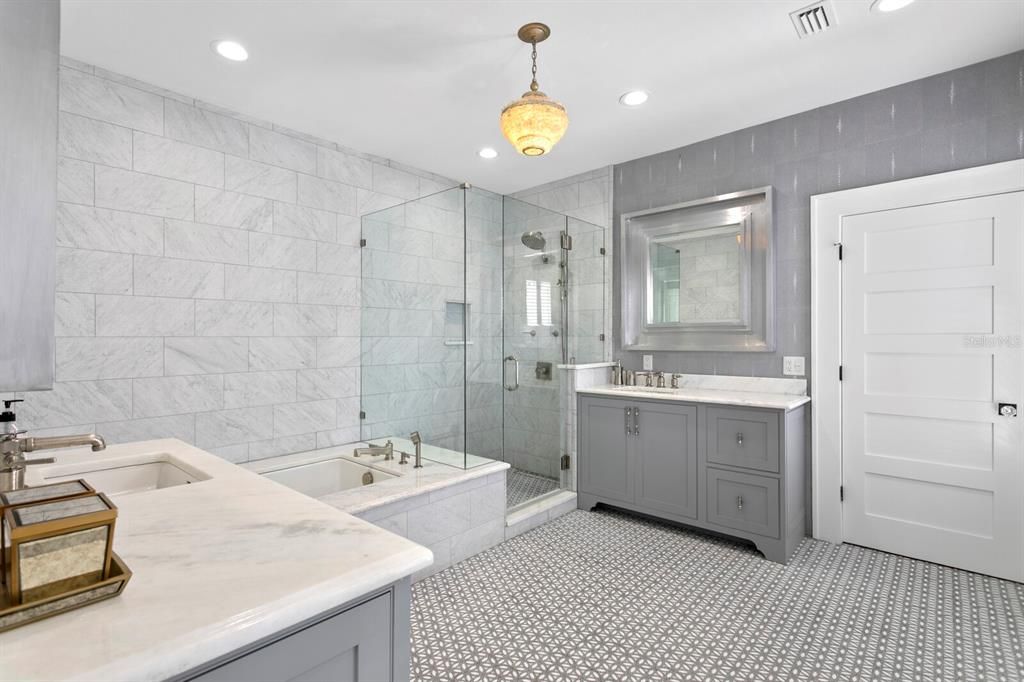 Bathroom, Dual Sink Vanities, Glass Shower, Interior, Marble Walls, Pendant Lights, Recessed Lighting