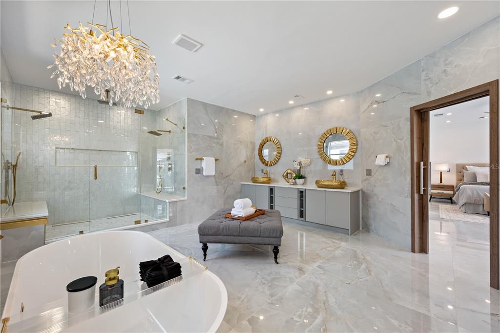 Bathroom, Bedroom, Dual Sink Vanities, Free Standing Baths, Glass Shower, Interior, Marble, Marble Walls, Pendant Lights, Recessed Lighting
