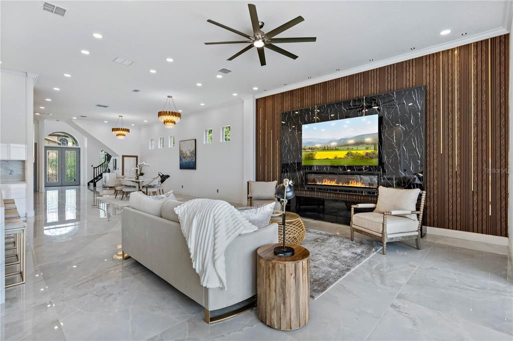 Dining room, Fireplace, Interior, Living room, Marble, Marble Walls, Pendant Lights, Recessed Lighting