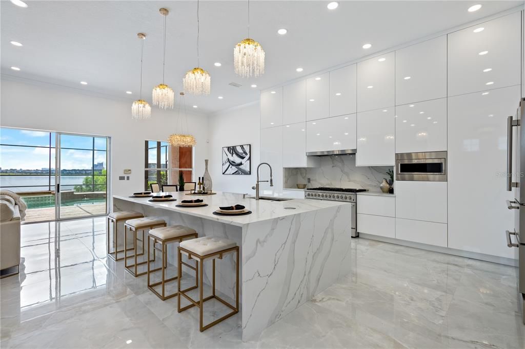 Interior, Kitchen, Marble, Marble Walls, Pendant Lights, Recessed Lighting, Stainless Steel Appliances