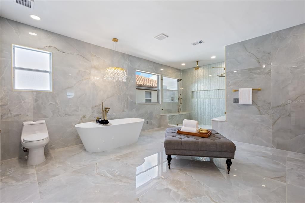 Bathroom, Free Standing Baths, Glass Shower, Interior, Marble, Marble Walls, Pendant Lights, Recessed Lighting
