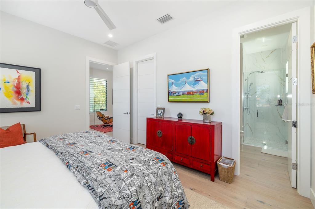 Bathroom, Bedroom, Glass Shower, Interior, Marble Walls, Recessed Lighting, Wood Texture Flooring