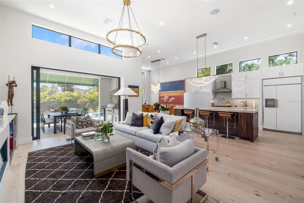 Dining room, Interior, Kitchen, Living room, Pendant Lights, Recessed Lighting, Stainless Steel Appliances, Wood Texture Flooring