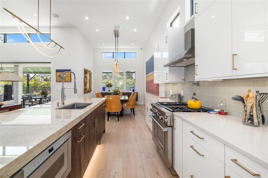 Dining room, Interior, Kitchen, Pendant Lights, Recessed Lighting, Stainless Steel Appliances, Wood Texture Flooring