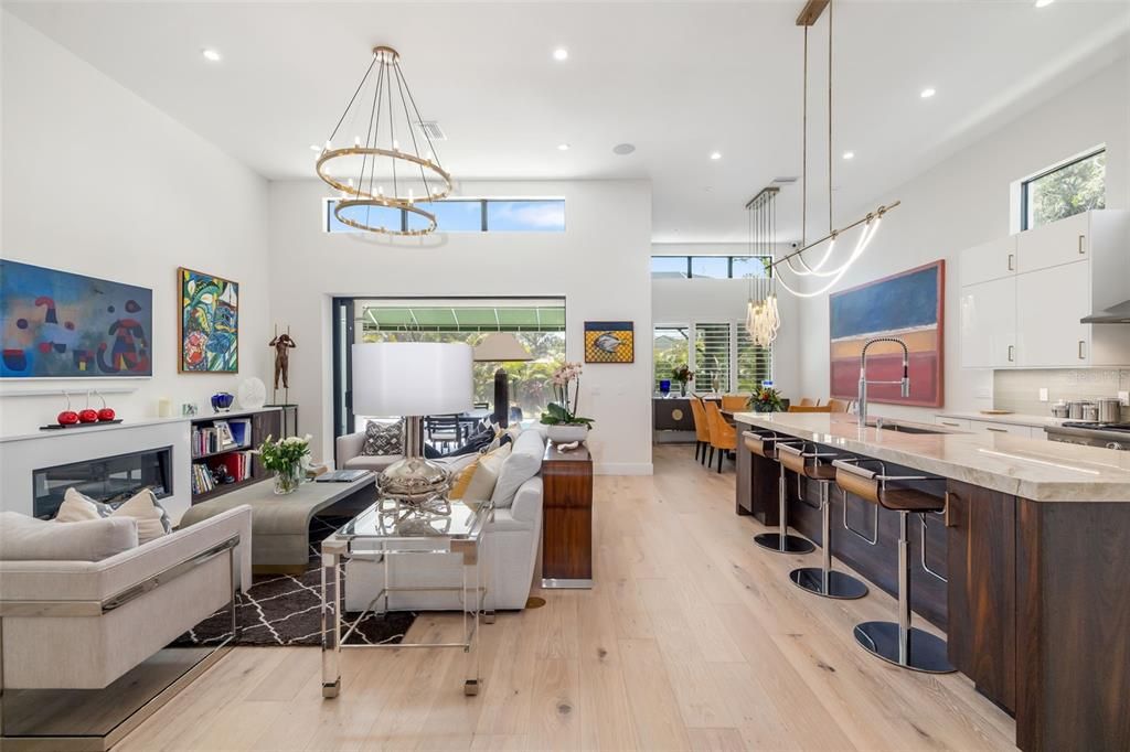 Chandelier, Dining room, Interior, Kitchen, Living room, Pendant Lights, Recessed Lighting, Wood Texture Flooring