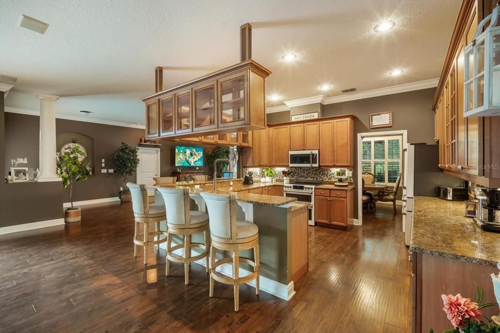 Dining room, Interior, Kitchen, Recessed Lighting, Stainless Steel Appliances, Wood Texture Flooring