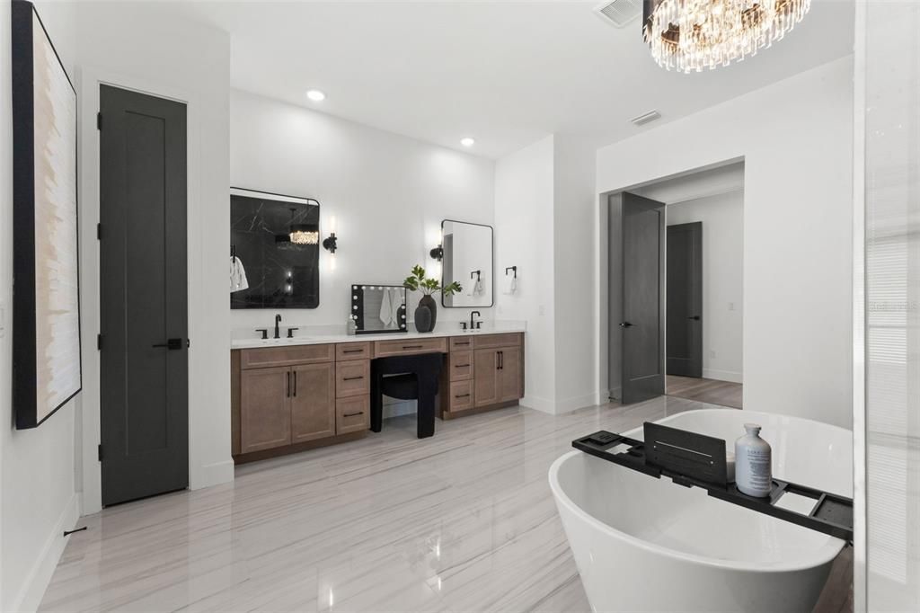 Bathroom, Chandelier, Dual Sink Vanities, Free Standing Baths, Interior, Recessed Lighting