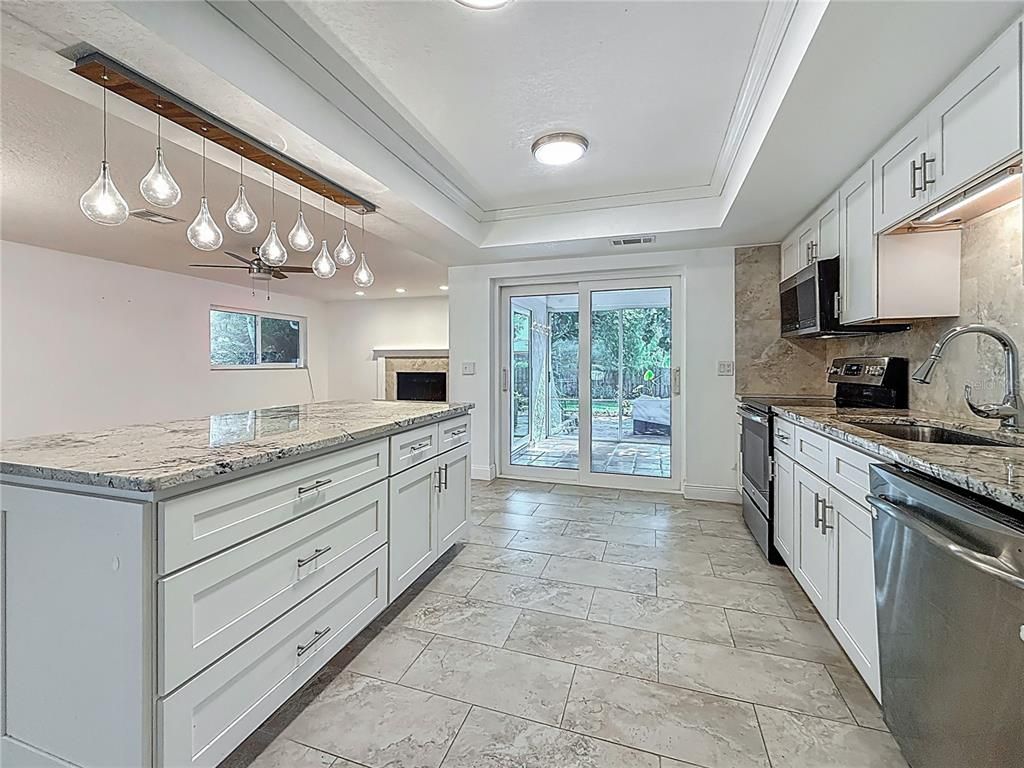 Interior, Kitchen, Marble, Pendant Lights, Recessed Lighting, Stainless Steel Appliances