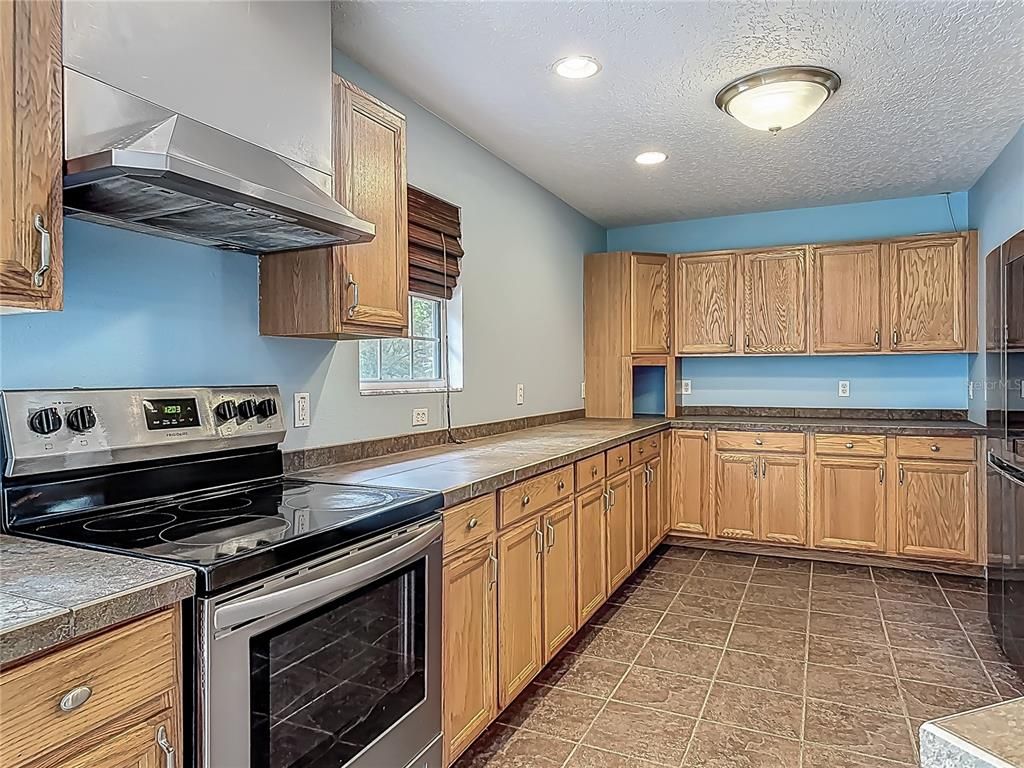Interior, Kitchen, Recessed Lighting, Tile Countertops