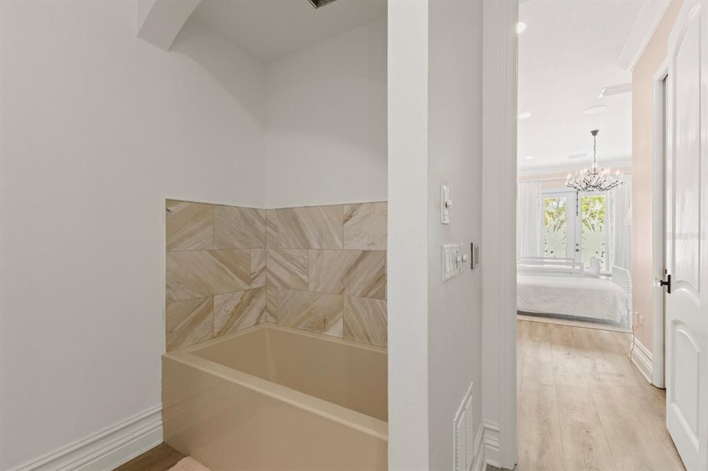 Bathroom, Chandelier, Interior, Marble Walls, Recessed Lighting, Wood Texture Flooring