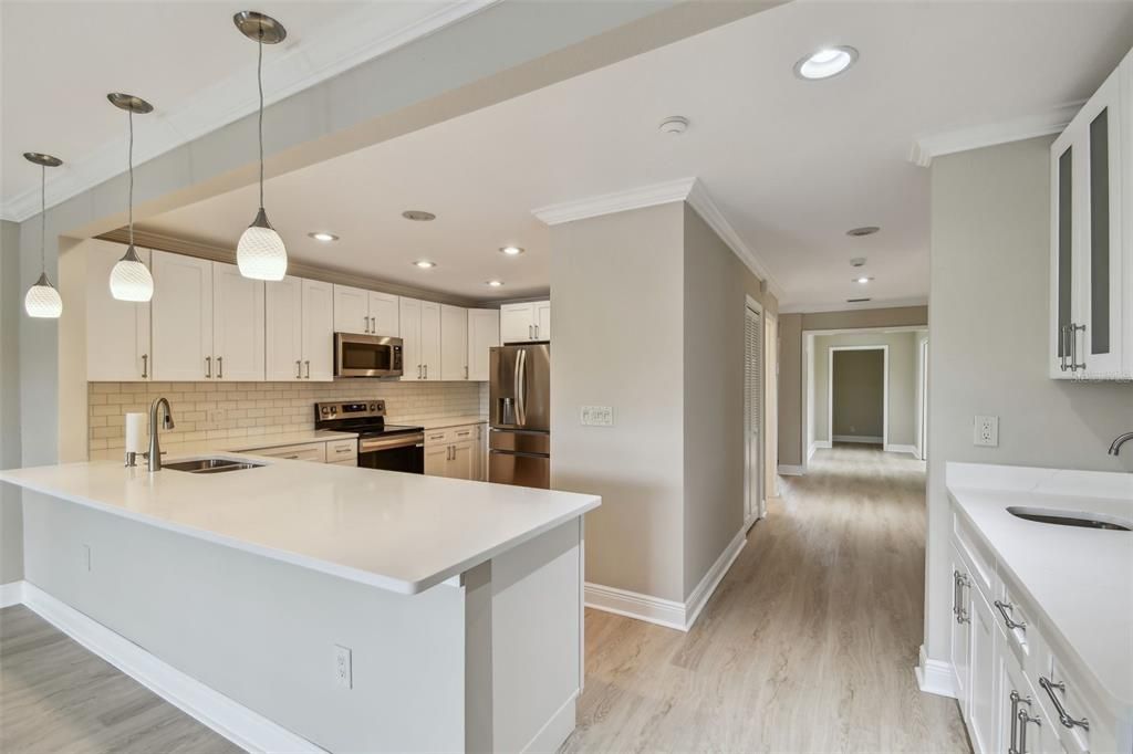 Interior, Kitchen, Pendant Lights, Recessed Lighting, Stainless Steel Appliances, Wood Texture Flooring