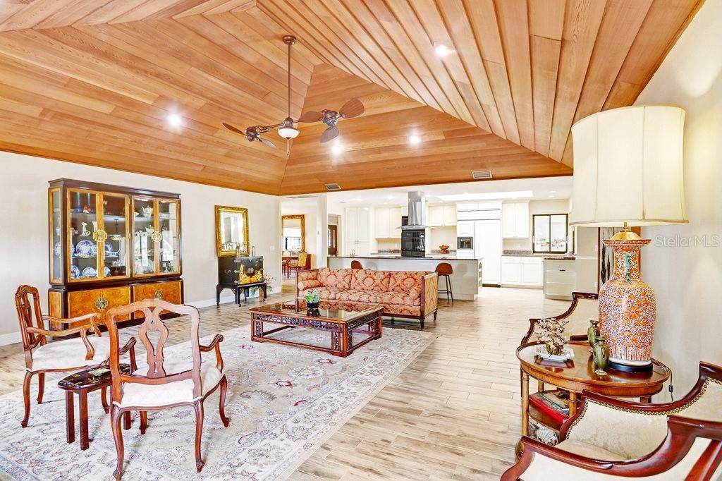 Dining room, Interior, Kitchen, Living room, Recessed Lighting, Stainless Steel Appliances, Wooden Ceilings, Wood Texture Flooring