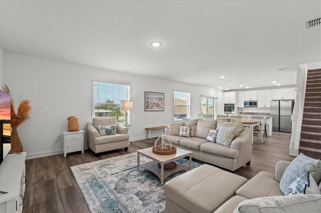 Dining room, Interior, Kitchen, Living room, Recessed Lighting, Stainless Steel Appliances, Wood Texture Flooring