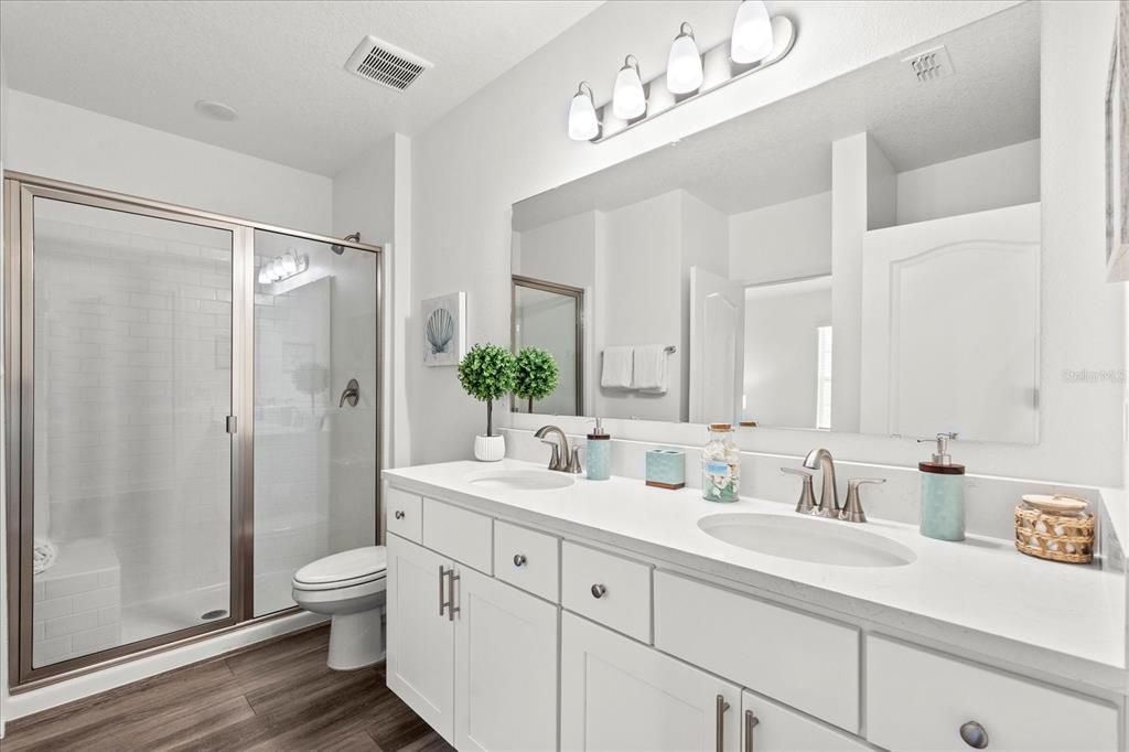 Bathroom, Dual Sink Vanities, Glass Shower, Interior, Wood Texture Flooring