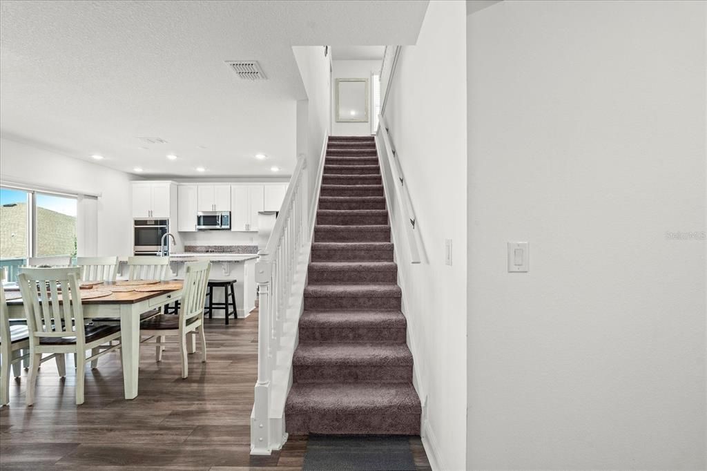Dining room, Interior, Kitchen, Recessed Lighting, Stainless Steel Appliances, Wood Texture Flooring