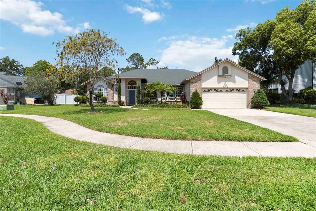 Attached, Backyard, Exterior, Facade, Brick Facade, Ranch