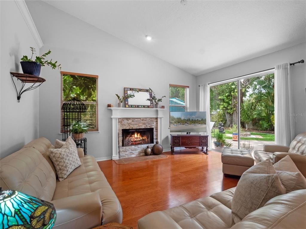 Fireplace, Interior, Living room, Recessed Lighting, Wood Texture Flooring
