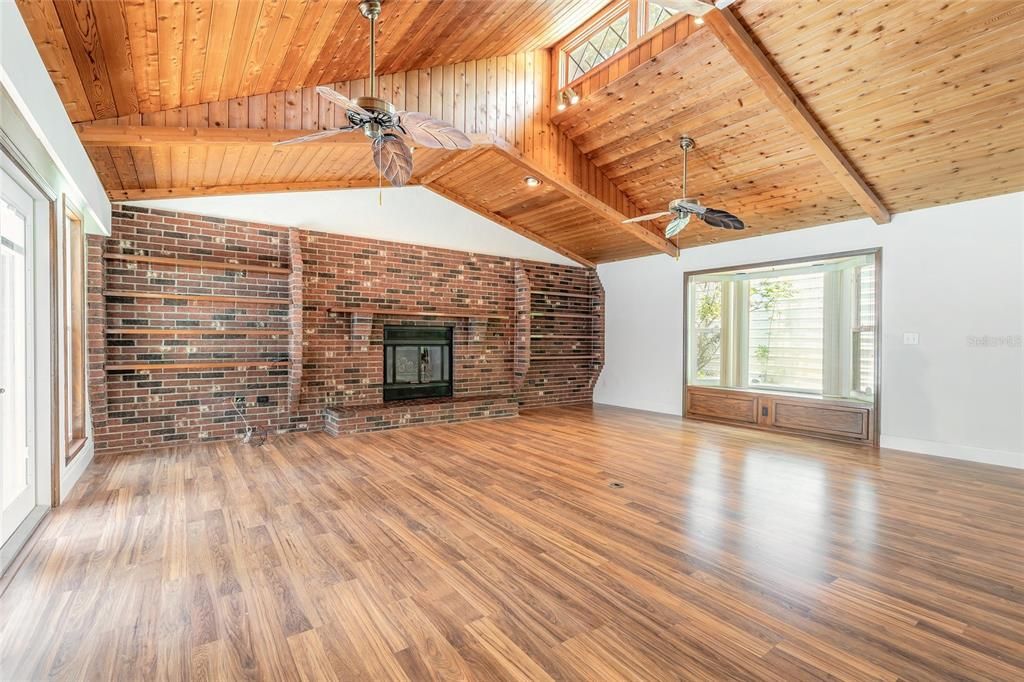 Empty room, Fireplace, Interior, Recessed Lighting, Stone Walls, Wooden Beams, Wooden Ceilings, Wood Texture Flooring