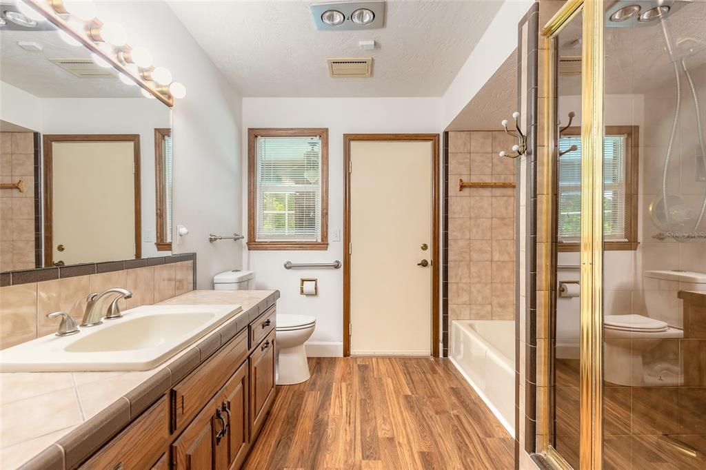 Bathroom, Glass Shower, Interior, Tile Countertops, Wood Texture Flooring