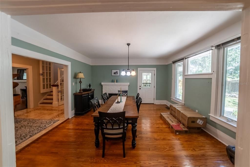 Dining room, Fireplace, Interior, Pendant Lights, Wood Texture Flooring