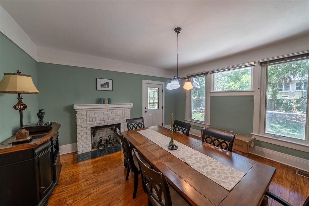Dining room, Fireplace, Interior, Pendant Lights, Wood Texture Flooring