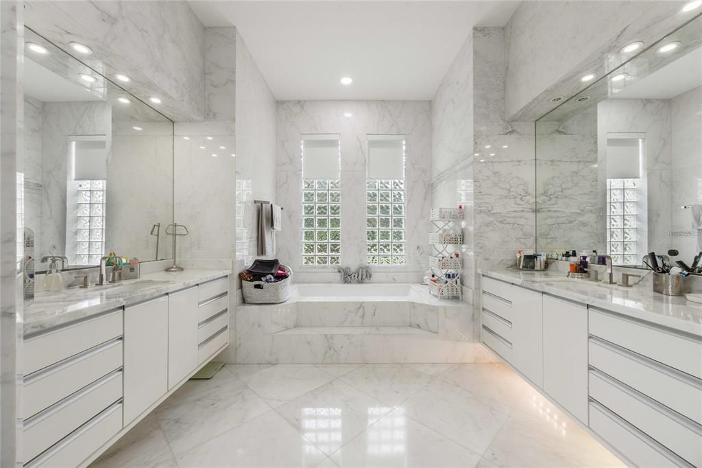 Bathroom, Dual Sink Vanities, Glass Shower, Interior, Marble, Marble Walls, Recessed Lighting