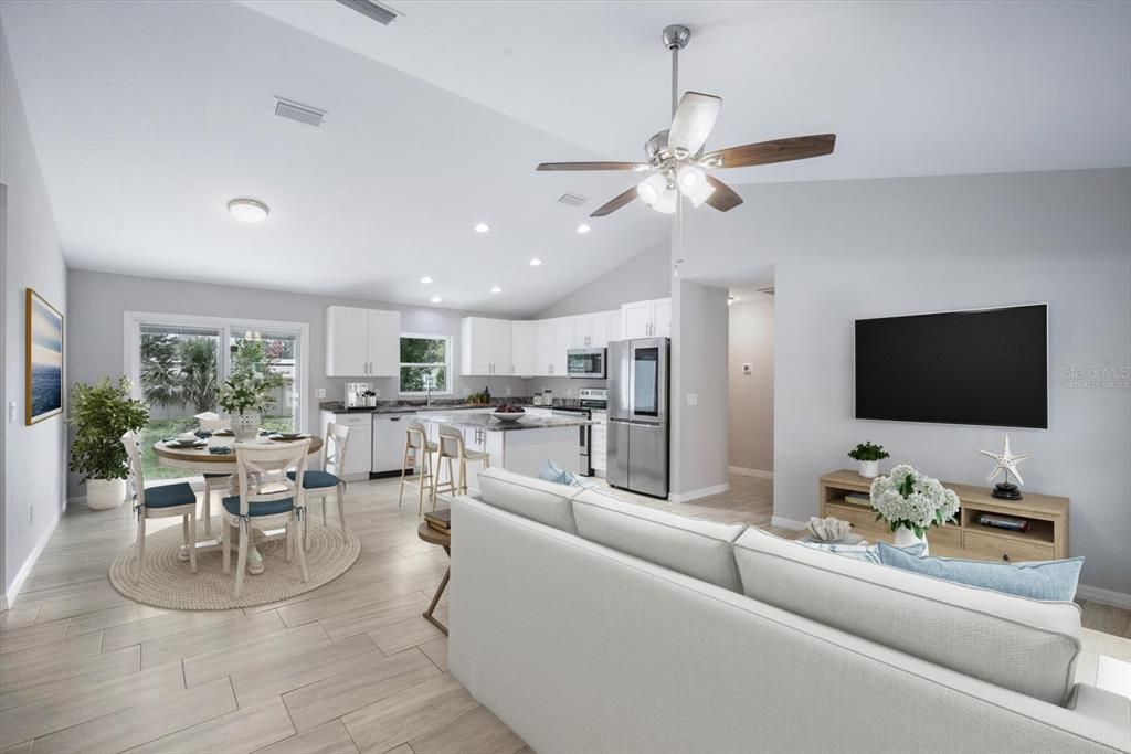 Dining room, Interior, Kitchen, Living room, Recessed Lighting, Stainless Steel Appliances, Wood Texture Flooring