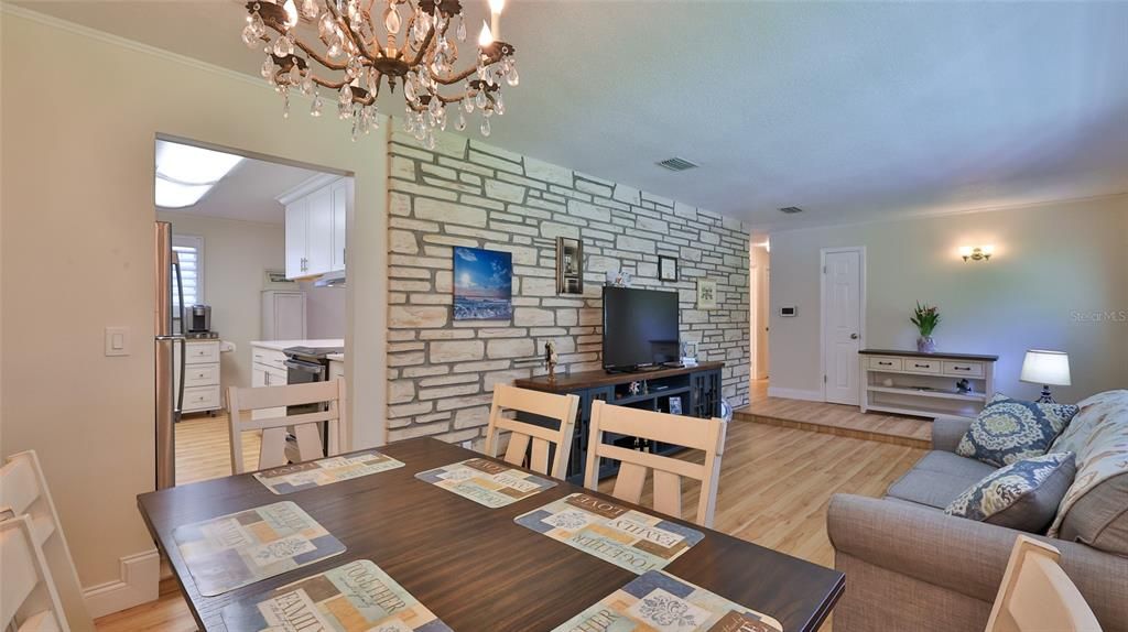 Chandelier, Dining room, Interior, Living room, Stone Walls, Wood Texture Flooring