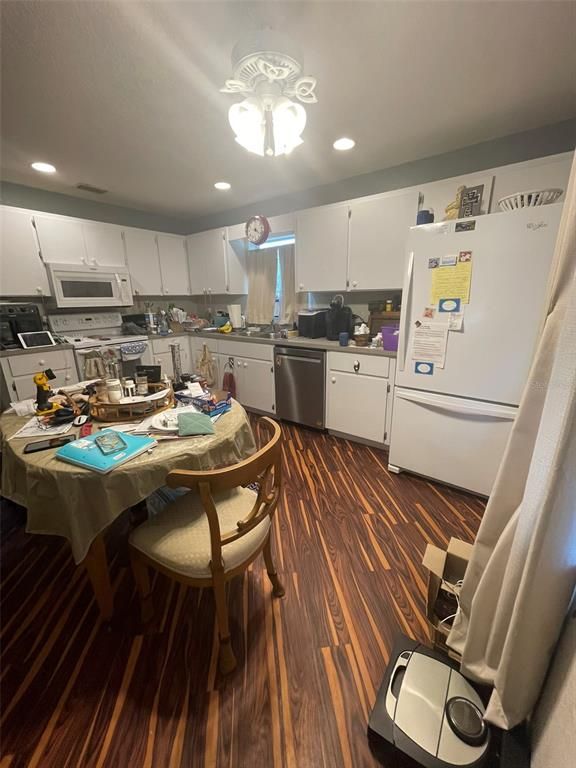 Dining room, Interior, Kitchen, Recessed Lighting, Stainless Steel Appliances, Wood Texture Flooring