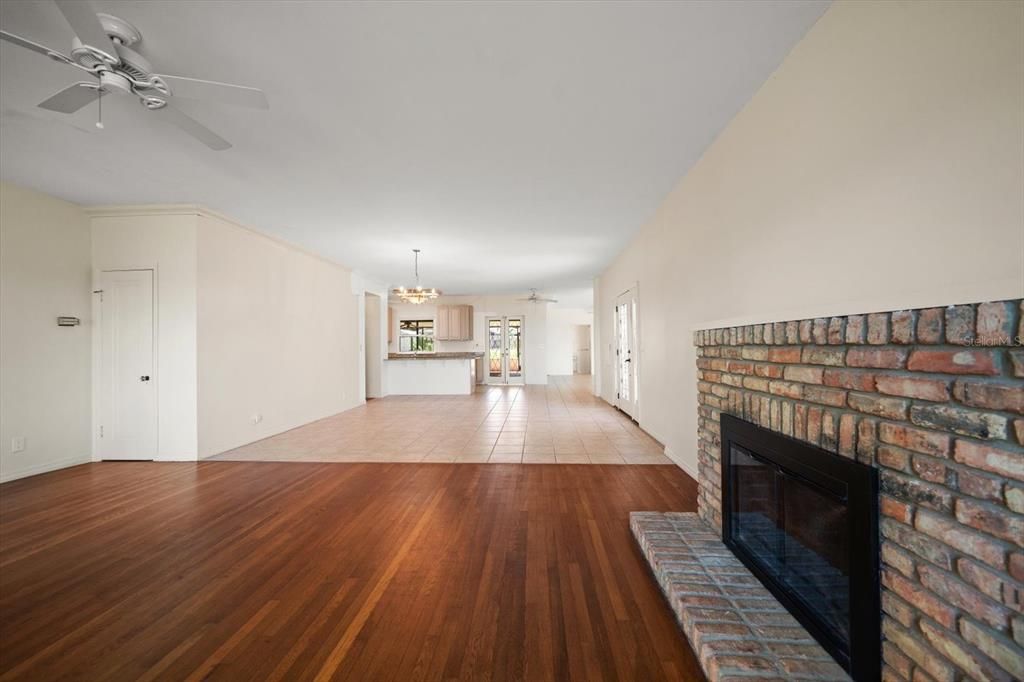 Chandelier, Empty room, Fireplace, Interior, Wood Texture Flooring