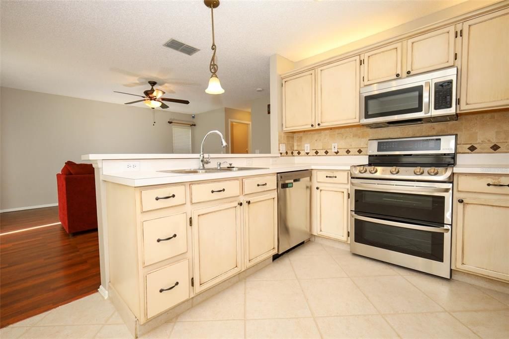 Interior, Kitchen, Pendant Lights, Stainless Steel Appliances, Wood Texture Flooring