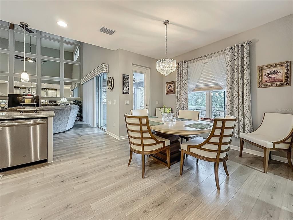 Chandelier, Dining room, Interior, Living room, Pendant Lights, Recessed Lighting, Wood Texture Flooring