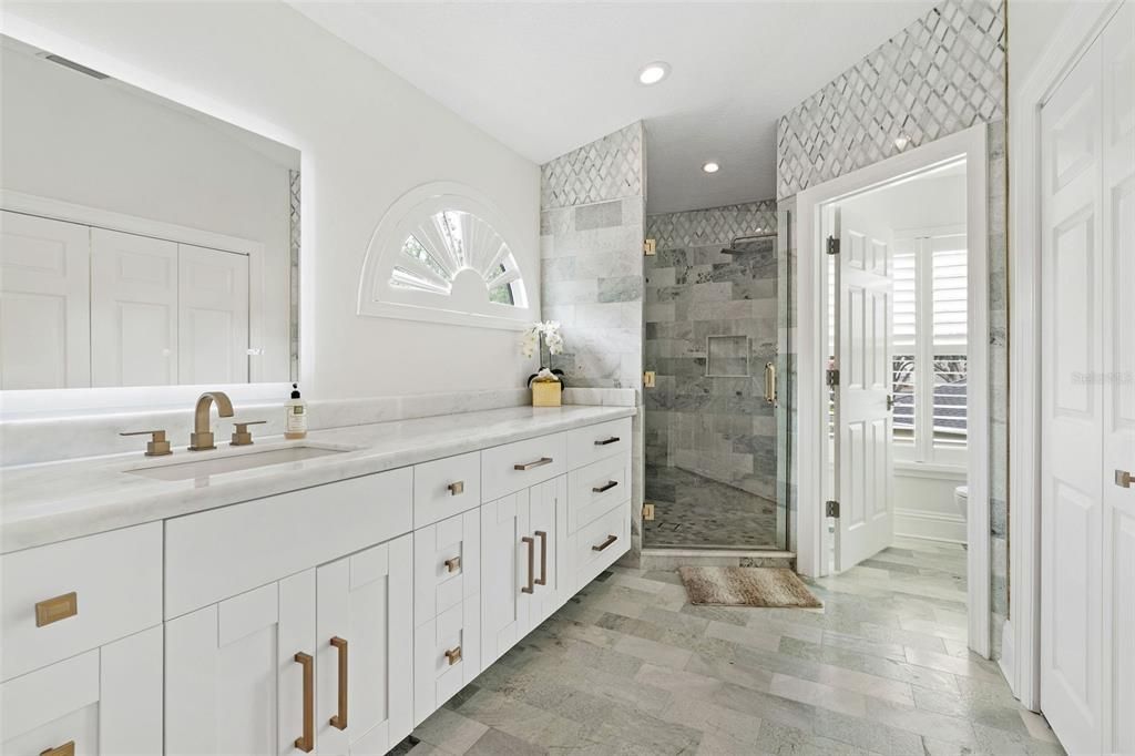 Bathroom, Dual Sink Vanities, Glass Shower, Interior, Recessed Lighting, Wood Texture Flooring