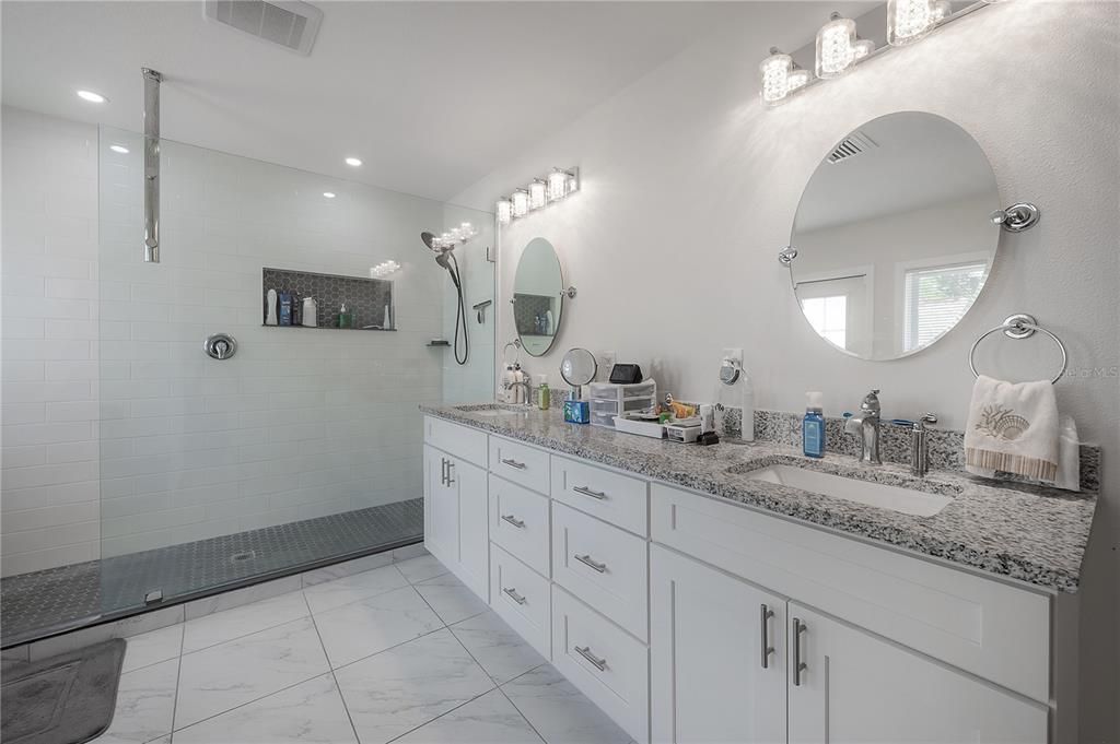 Bathroom, Dual Sink Vanities, Glass Shower, Interior, Marble, Recessed Lighting