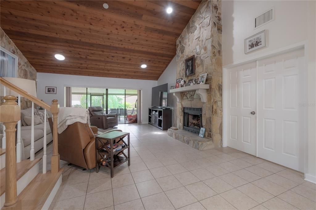 Fireplace, Interior, Living room, Recessed Lighting, Stone Walls, Wooden Ceilings