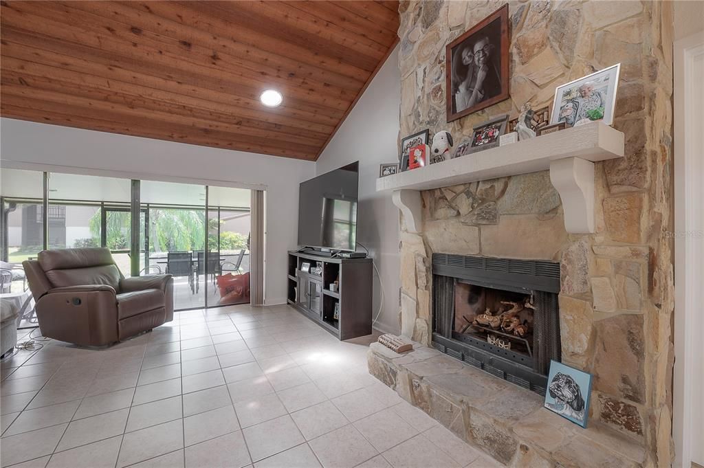 Fireplace, Interior, Living room, Recessed Lighting, Stone Walls, Wooden Ceilings