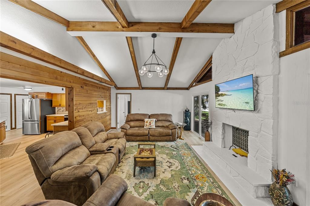 Chandelier, Fireplace, Interior, Kitchen, Living room, Pendant Lights, Stone Walls, Wooden Beams, Wood Texture Flooring, Wooden Walls
