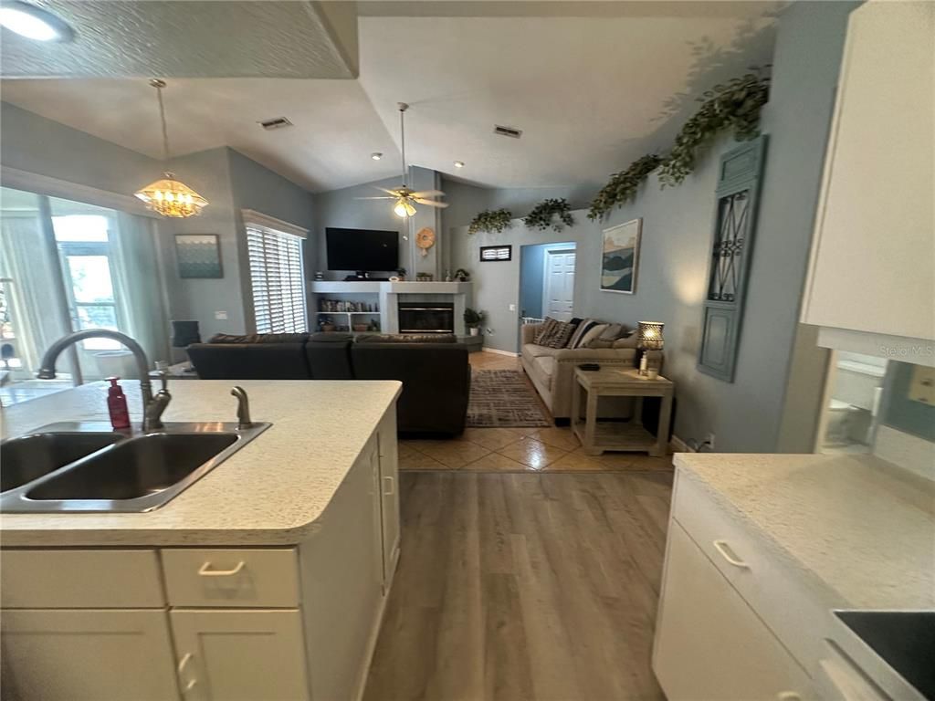 Fireplace, Interior, Kitchen, Living room, Pendant Lights, Recessed Lighting, Wood Texture Flooring