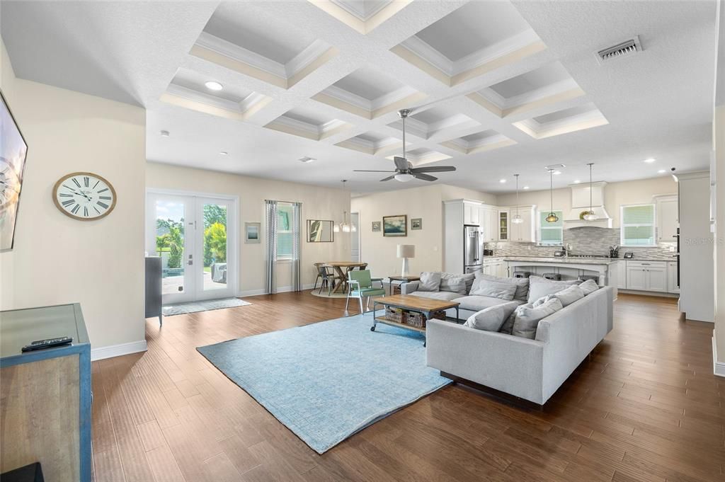 Dining room, Interior, Kitchen, Living room, Pendant Lights, Recessed Lighting, Stainless Steel Appliances, Wood Texture Flooring
