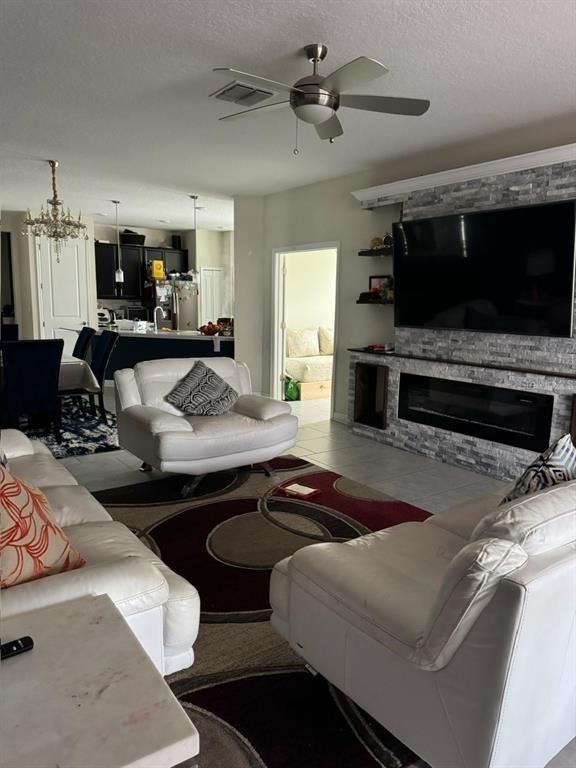 Chandelier, Dining room, Fireplace, Interior, Kitchen, Living room, Pendant Lights