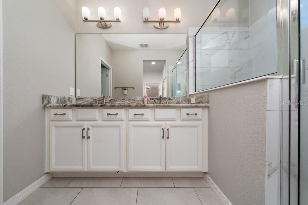 Bathroom, Dual Sink Vanities, Glass Shower, Interior, Marble Walls