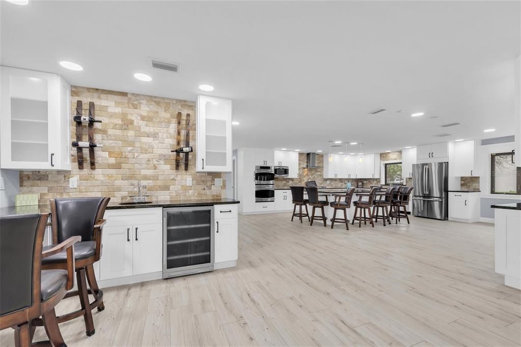 Interior, Kitchen, Recessed Lighting, Stainless Steel Appliances, Stone Walls, Wood Texture Flooring
