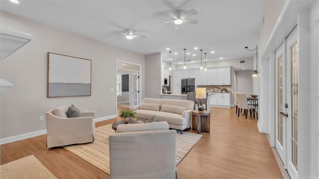 Dining room, Interior, Kitchen, Living room, Pendant Lights, Recessed Lighting, Stainless Steel Appliances, Wood Texture Flooring