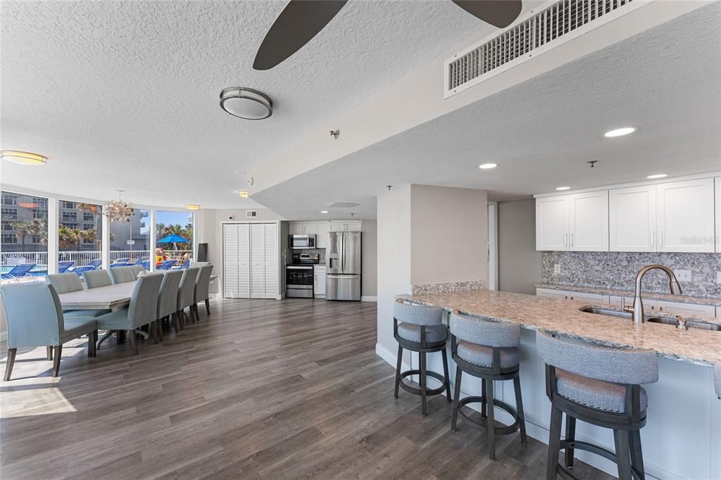 Chandelier, Dining room, Interior, Kitchen, Recessed Lighting, Stainless Steel Appliances, Wood Texture Flooring