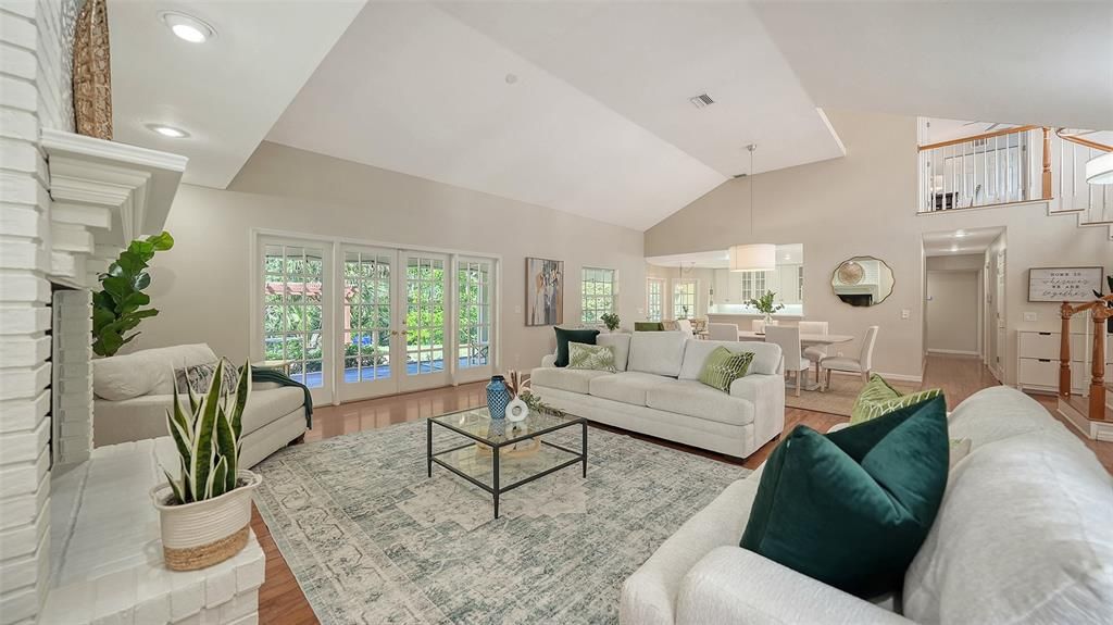 Dining room, Fireplace, Interior, Living room, Recessed Lighting, Wood Texture Flooring
