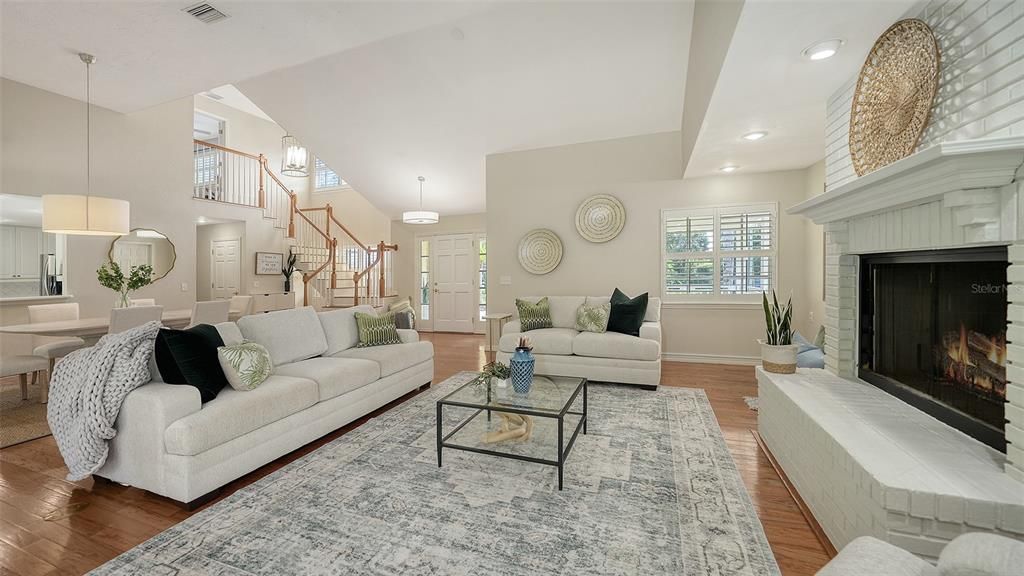 Dining room, Fireplace, Interior, Living room, Pendant Lights, Recessed Lighting, Wood Texture Flooring