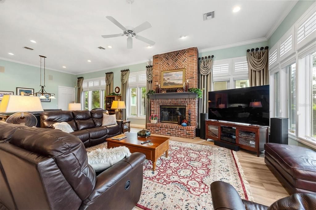 Fireplace, Interior, Living room, Pendant Lights, Recessed Lighting, Stone Walls, Wood Texture Flooring