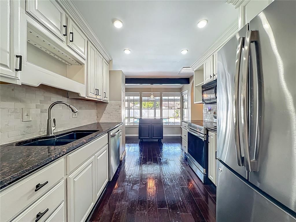 Interior, Kitchen, Recessed Lighting, Stainless Steel Appliances, Wood Texture Flooring
